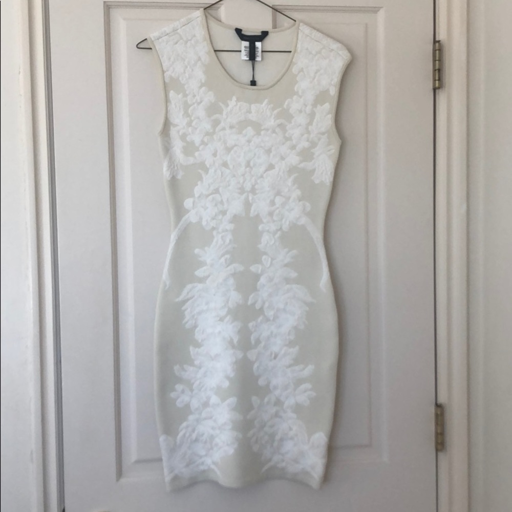 Women’s dress new with tags..never worn $75 is 1/4 original price… gorgeous